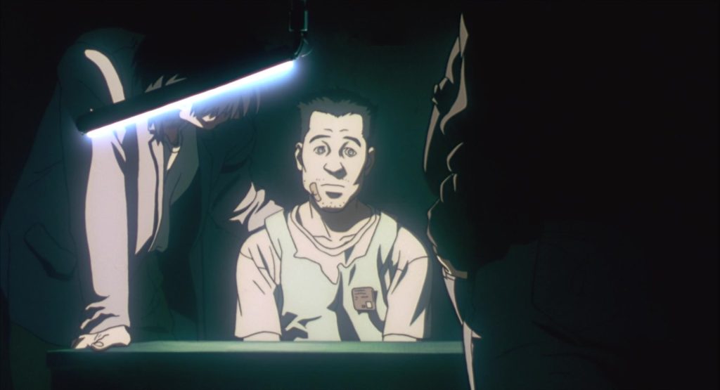Figure 5. Screencap: Interrogation scene of construction worker. Oshii, Mamoru. Ghost in the Shell. Manga Entertainment, 1998, DVD.