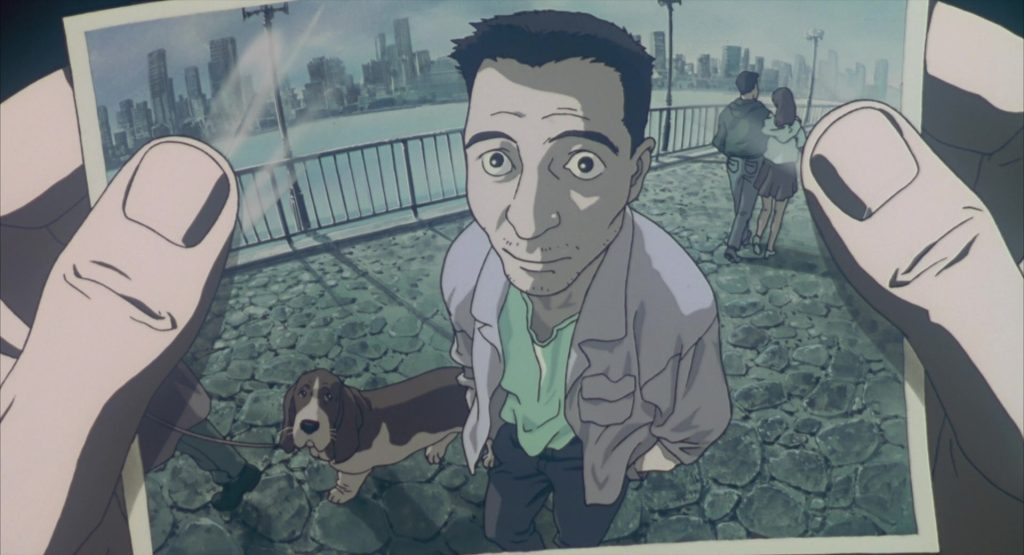 Figure 6. Screencap: Continuation of the scene showcasing a picture of the construction worker replicating the lens distortion of a camera. Oshii, Mamoru. Ghost in the Shell. Manga Entertainment, 1998, DVD.